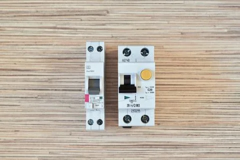 Two differential circuit breakers in different versions. Stock Photos