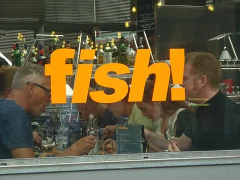 Two diners inside a fish restaurant in London, UK. Stock Photos