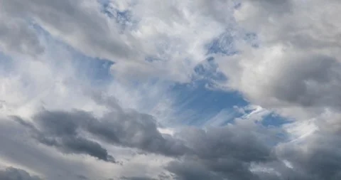 Two direction moving clouds Stock Footage 285969097