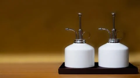Two dispenser jars in white ceramic for psd graphic resource with copy space Stock Photos