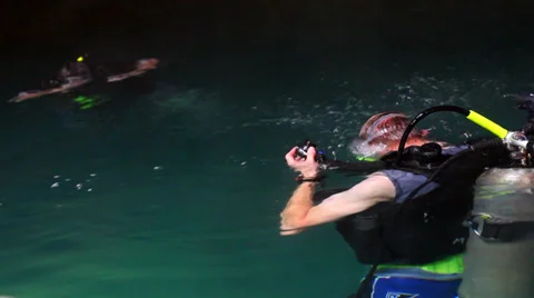 Two Divers Descending into an Underground Cave 스톡 동영상 33193567