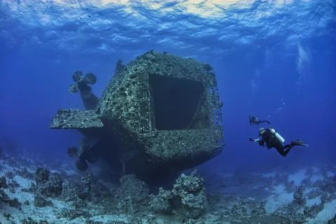 Two divers exploring the sunken ferry Salen express Stock Photos