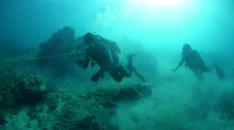 Two divers on the ocean bottom Stock Footage 40731581