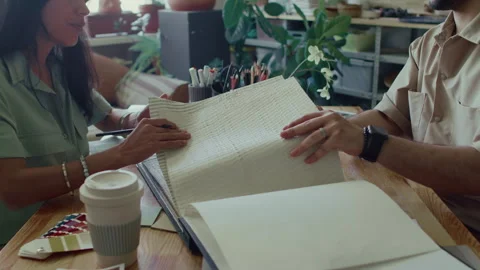 Two Diverse Designers Selecting Combinations of Materials for Interior Stock Footage 292930128