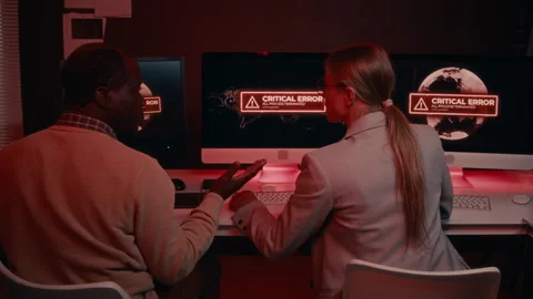 Two Diverse IT Security Specialists Frantically Defending from Hacker Attack 스톡 동영상 288794213