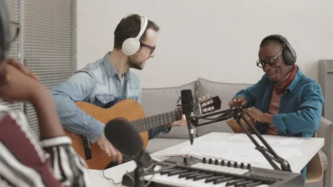 Two Diverse Musicians Having Performance during Radio Program Stockbeeldmateriaal 154800940