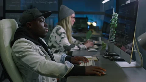 Two Diverse Software Developers Writing Computer Code in Office Stock Footage 273832343