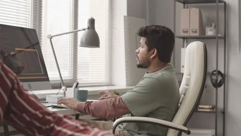 Two Diverse Video Game Developers Working in Team Stock Footage 172192548