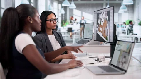 Two Diverse Women Using 3D CAD Software Stock Footage 334924256