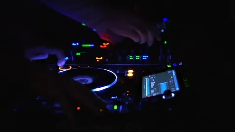 Two DJs are Mixing in Twilight Stock Footage 123001713