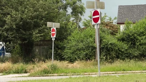 Two do not enter road street signs, one in foreground Stock Footage 246610824