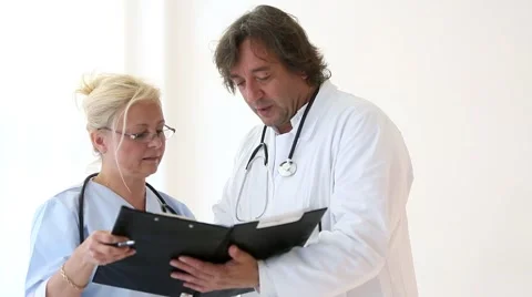 Two doctors discussing Stock Footage 52131842