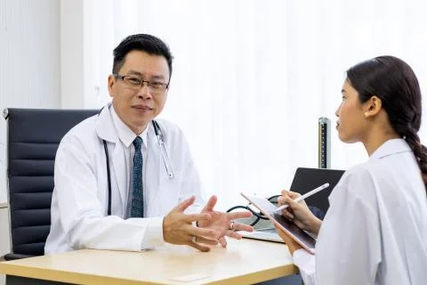 Two doctors discussing Stock Photos