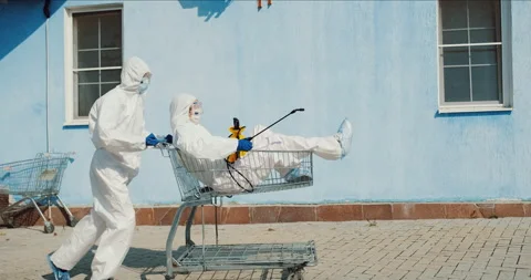 Two doctors epidemiologists have fun, concept of positive covid-10 pandemic end. Stock Footage 131095784