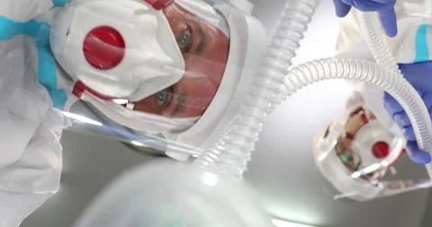 Two doctors holding medical instruments in the emergency room. Medical specia Stock Footage 152858480