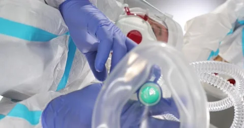 Two doctors holding medical instruments in the emergency room. Medical specia Stock Footage 152858577