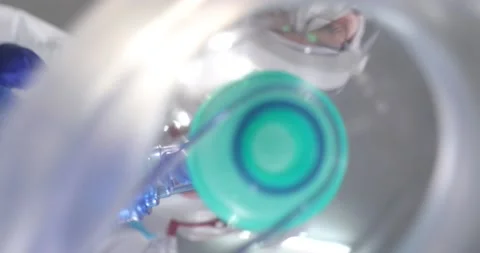 Two doctors holding medical instruments in the emergency room. Medical specia Stock Footage 152858703