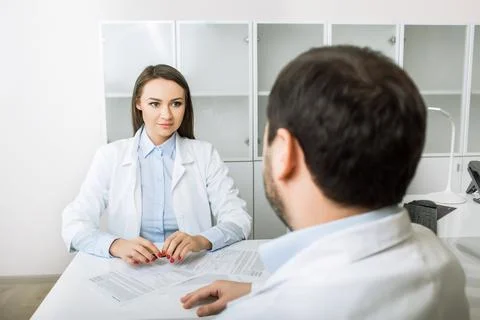 Two doctors talk at the clinic 스톡 사진