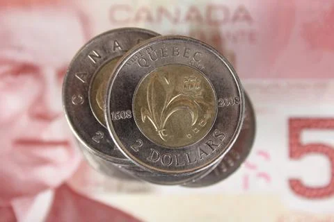 Two dollar coins Stock Photos