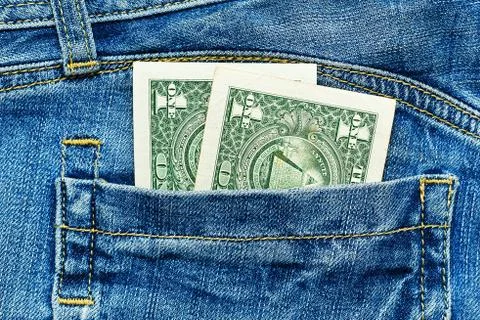 Two dollar notes in jeans pocket Stock Photos