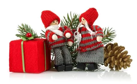 Two dolls with pine cone, gift box and spruce branches. Christmas ornaments i Stock Photos