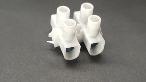 Two domino wire connectors Stock Footage 245000844
