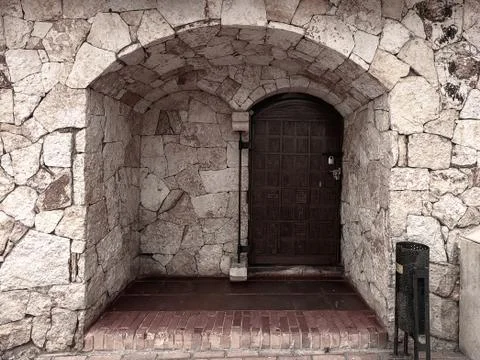 Two doors in stone wall Stockfoto's