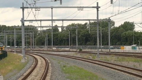 Two Double decker train with passengers passing simultaneously Stock Footage 110018213