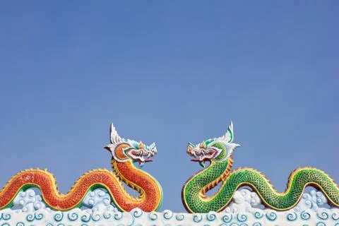 Two dragon in blue sky Stock Photos