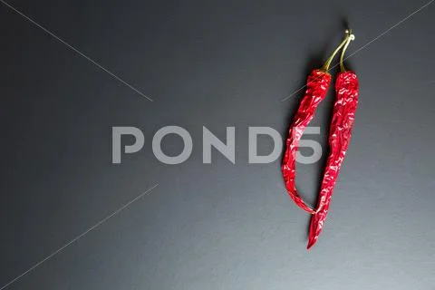 Two Dried Chili Peppers.