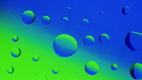 Two drops connect together on a blue-green gradient background. 스톡 동영상 303059658