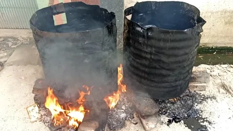 Two Drums Boiling Road Coal Tar Pitch Over Open Fire Outdoor Setting Stock Footage 299937675