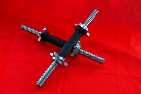 Two Dumbbell neck with shiny thread and rubberized black handle without metal Stock Photos