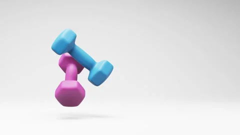 Two Dumbbells Spinning on Studio Light Gray Background with Copy Space Stock Footage 221583024