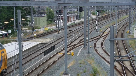 Two Dutch Double Decker train departing Stock Footage 112361408