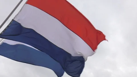 Two Dutch flags in the wind in Scheveningen Stock Footage 120914724
