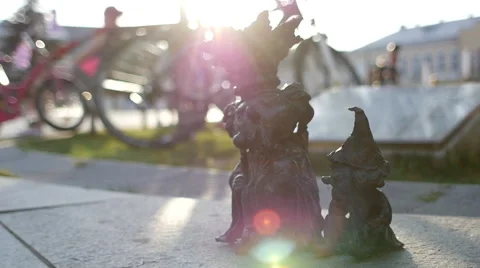 Two dwarfs brass sculpture Stock Footage 64669789