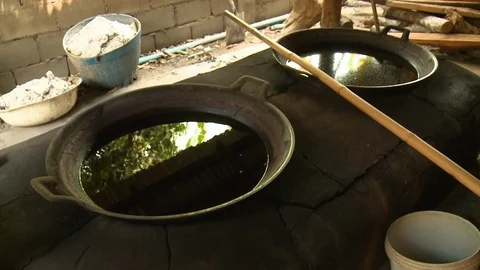 Two dye pots used for dyeing textiles Stock-Footage 120002195