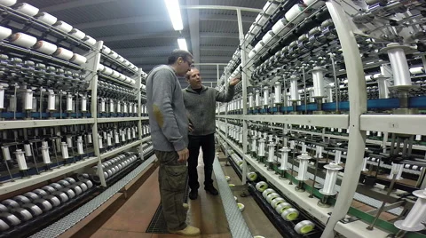 Two Dynamic Textile Engineers at Work Stock Footage 63464940