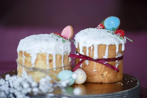 Two Easter cakes and colored eggs Stock Photos