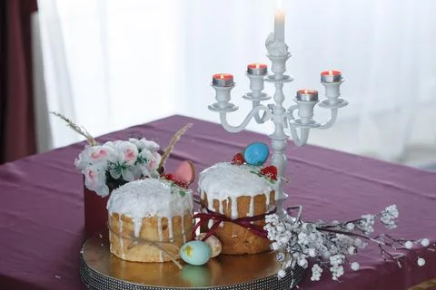 Two Easter cakes and colored eggs Stock Photos