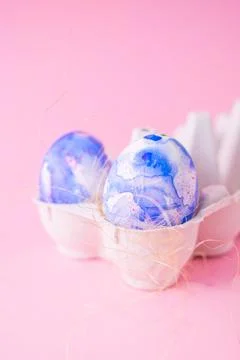 Two easter eggs decorated with classic blue watercolour aquarelle in carton 스톡 사진