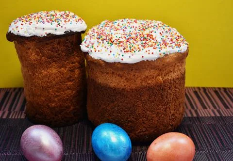 Two Easter homemade Easter cake and three Easter eggs Stock Photos