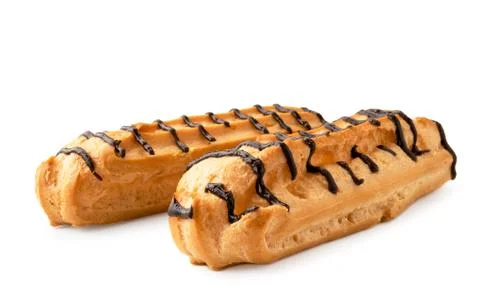 Two eclairs drenched in chocolate close-up on a white. Isolated. Stock Photos