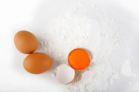 Two egg on flour Stock Photos