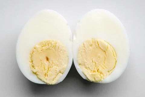 Two egg halves Stock Photos