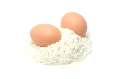 Two eggs and flour for baking Stock Photos