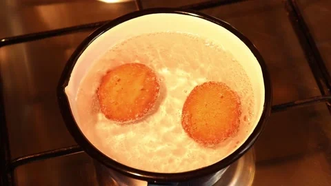 Two eggs are boiled in boiling water. Stock Footage 149819566