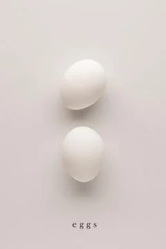 Two eggs in a shell on a white background. graphic photo for interior design Foto stock