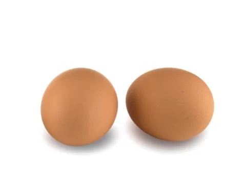 Two eggs on white background Stock Photos